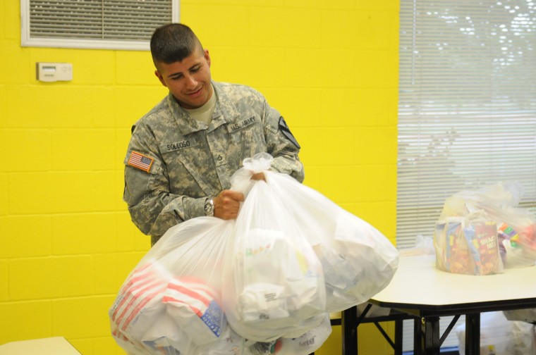 Adopted school gives back to deploying “Long Knife” unit